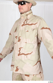  Photos Army Man in Camouflage uniform 12 21th century Army desert uniform jacket upper body 0002.jpg